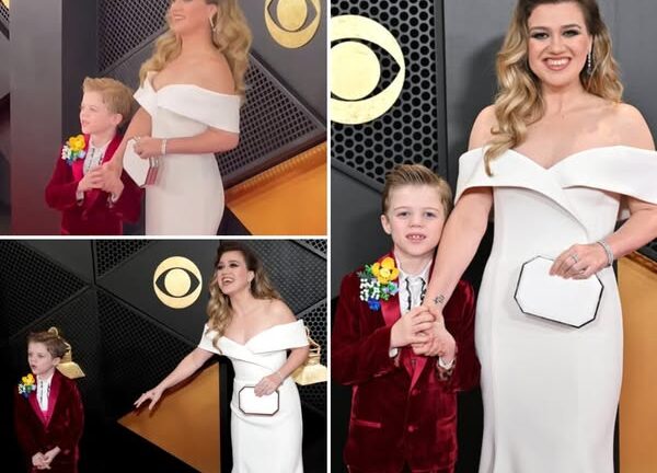 No Need For Brandon Blackstock—Kelly Clarkson Already Has This “Charming Gentleman” Escorting Her On The Red Carpet! After Struggling Through The Aftermath Of Her Divorce With Various Negative Coping Methods, Kelly Has Finally Found Her Happiness! She Has Two Adorably Wonderful Children, And She Proudly Brought Them Along To Celebrate Her Prestigious Grammy Win! The Moment Kelly Arrived At The Event With Her Son, Remi, Instantly Went Viral, Receiving Countless Compliments For Their Sweet Bond—Especially For Kelly, As Fans Praised Her For Her Positive Transformation! See More Below!